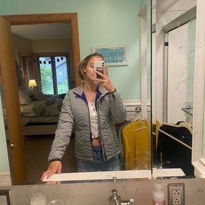 grey and blue winter coat